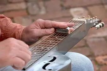 Corrediça de guitarra de aço