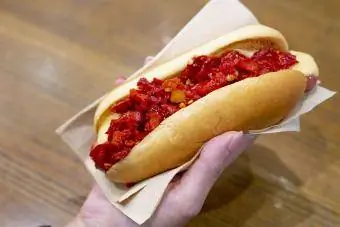 hotdog with sweet pepper topping