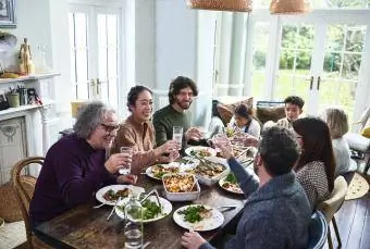 Extended family enjoying dinner together