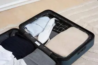Nori stoomstrijkijzer in een koffer