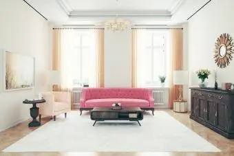 Art deco стилиндеги кызгылт диван жана кресло менен конок бөлмөсү