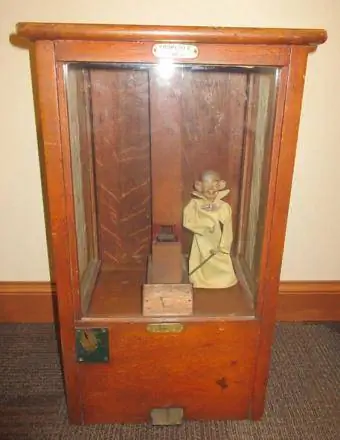 येलो किड एंटीक गंबल मशीन सी. 1899