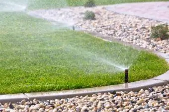 Pop up lawn sprinkler system